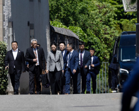 Markets near even keel amid trade deal hope
