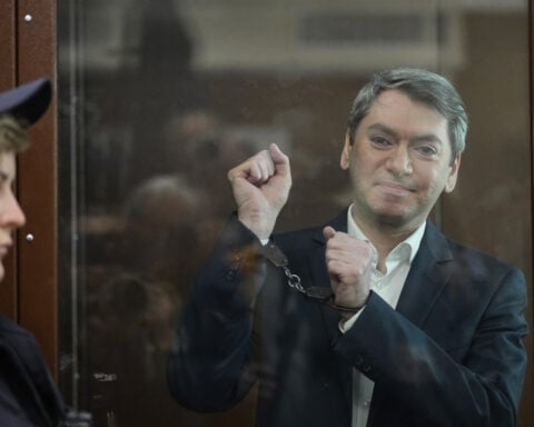 Russia convicts a prominent election monitoring activist and sentences him to 5 years in prison