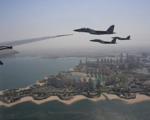 Trump's Qatar trip is off to a flying start as Air Force One gets another fighter jet escort