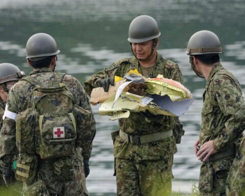 Japan starts emergency inspections on nearly 200 military training planes after crash
