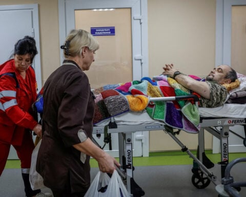 Amid diplomatic flurry, Ukrainian hospital treating war-wounded yearns for peace