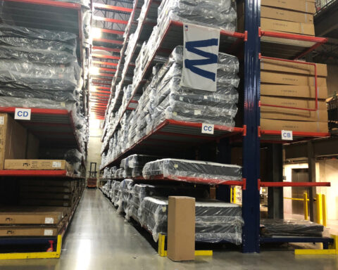US business inventories barely rise in March
