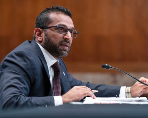 The FBI is disbanding one of its Washington-based public corruption squads, AP sources say