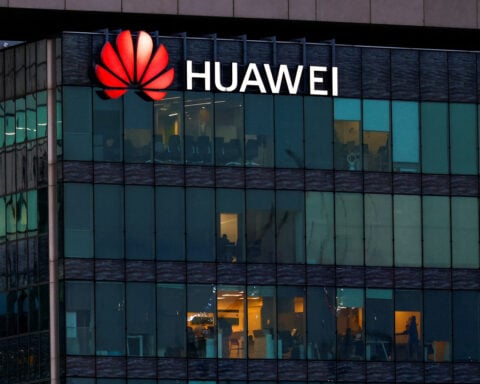 US judge in Huawei criminal case questions Trump order against law firm