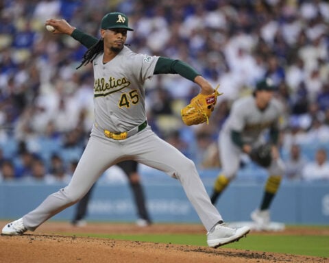 Ohtani homers twice and drives in 6 runs on his bobblehead night in Dodgers' 19-2 rout of Athletics