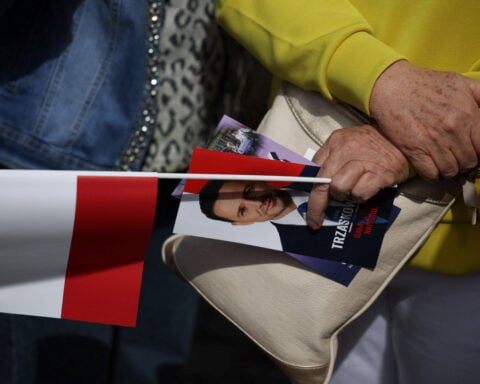 Polish presidential election frontrunner faces scrutiny over ads