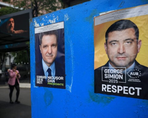 Romanian centrist has slight lead over hard-right ahead of tight Sunday vote-survey