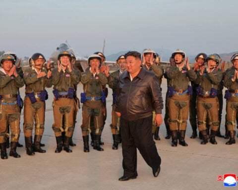 North Korea's Kim oversees air drills