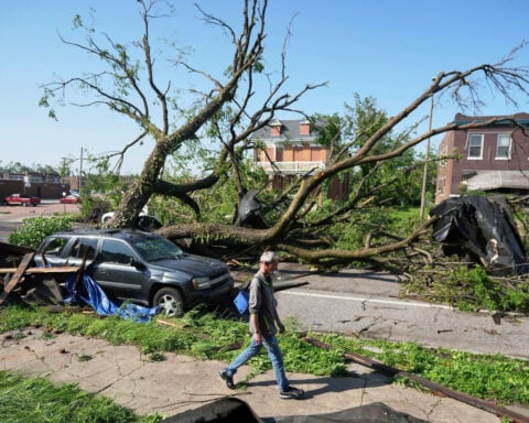 Tornado-spawning storms leave 25 dead in 2 states and swaths of destruction across central US
