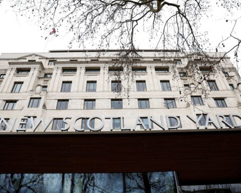 British police charge three Iranians as part of spying probe