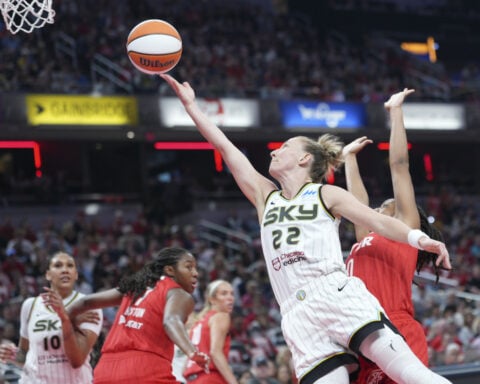 Clark's triple-double leads Fever past Sky 93-58 as tempers flare after hard foul in 3rd quarter