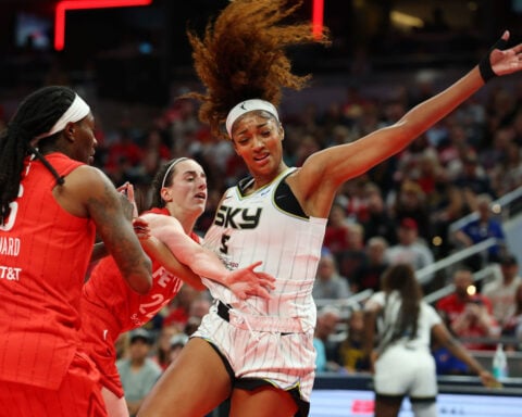 Caitlin Clark gets triple-double, flagrant foul for shoving Angel Reese in season-opening win