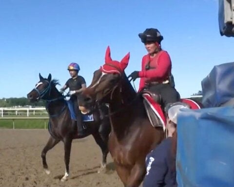 The 'cops' of the track: Meet the outriders, who keep horses and riders safe