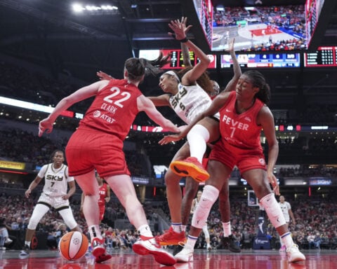 WNBA investigating racial slurs by fans made at Angel Reese during Indiana game, AP Source says