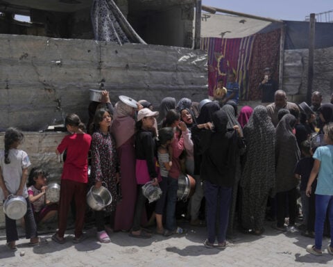 Live updates: After nearly 3 months of Israel's blockade, aid trucks enter Gaza
