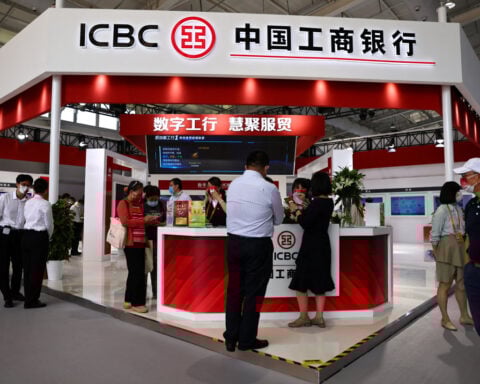 China's state banks will cut deposit rates on Tuesday, sources say