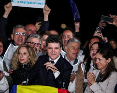EU leaders relieved after centrist beats pro-Trump rival to Romanian presidency