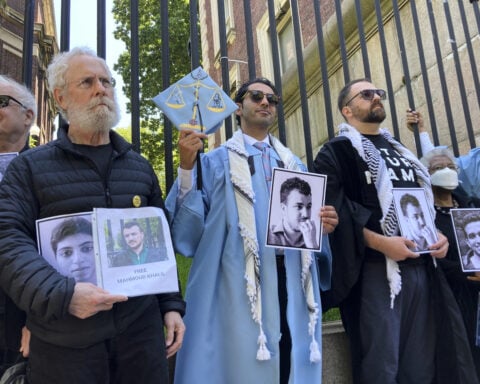 Freed from ICE custody, Palestinian activist Mohsen Mahdawi graduates from Columbia to cheers