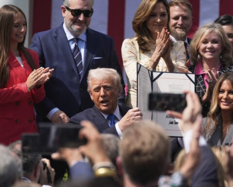 Trump, alongside the first lady, signs a bill to make posting 'revenge porn' a federal crime