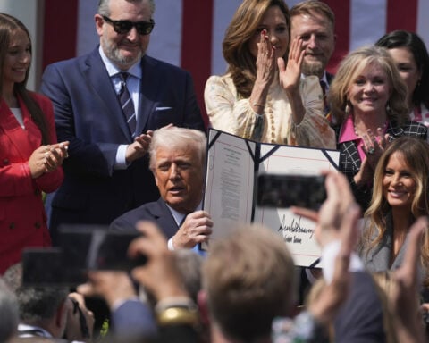 Trump signs a bill to make posting 'revenge porn' a federal crime. He had the first lady sign, too