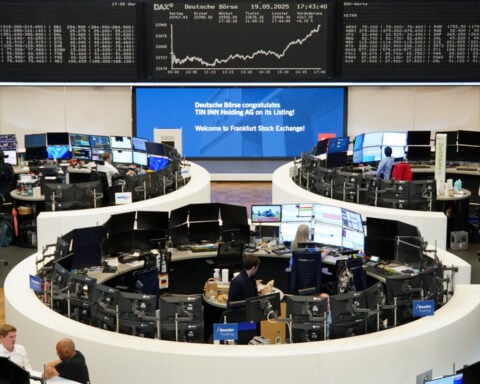 European shares close near nine-week high, powered by utility, telecom stocks