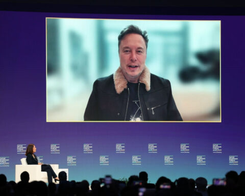 Elon Musk says he will lead Tesla for at least another five years