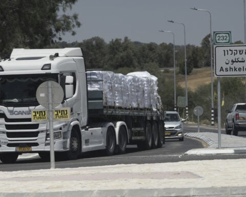 Israel is letting a trickle of aid into Gaza for the first time in 2 1/2 months. Here's what to know