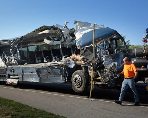 Shortage of overnight truck parking contributed to deadly Greyhound bus crash, regulators say
