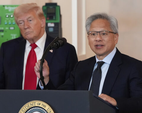 Trump drafts America's business titans to burnish his image at home and abroad