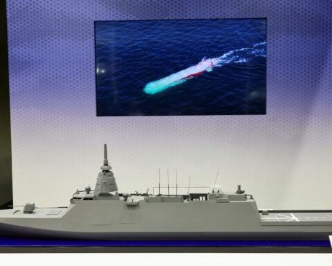 Japan flexes defence ambitions at arms show