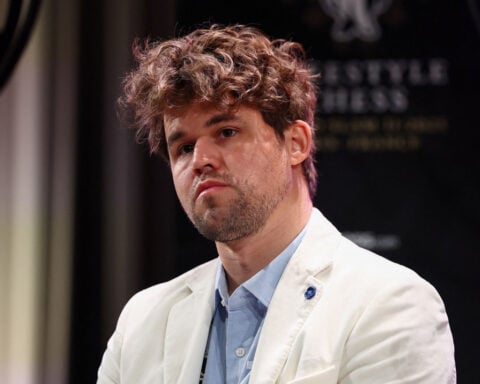 Magnus Carlsen held to draw by 143,000 opponents in largest ever online chess game after 46 days of competing