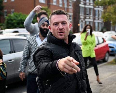 UK anti-Islam activist 'Tommy Robinson' charged with harassment of two men