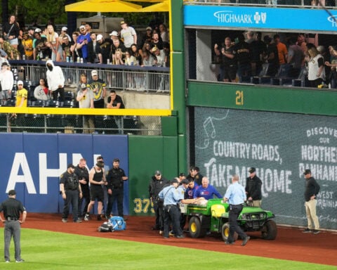 Man charged with supplying alcohol to 20-year-old who fell from outfield wall at Pirates game