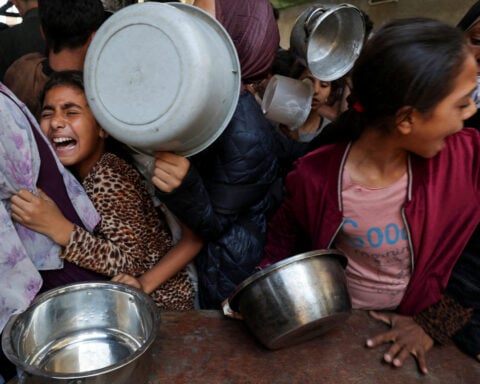 'Our children are dying slowly' says father searching for food in Gaza