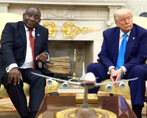 Trump seizes on videos of a fringe South African politician as evidence of threats to white farmers