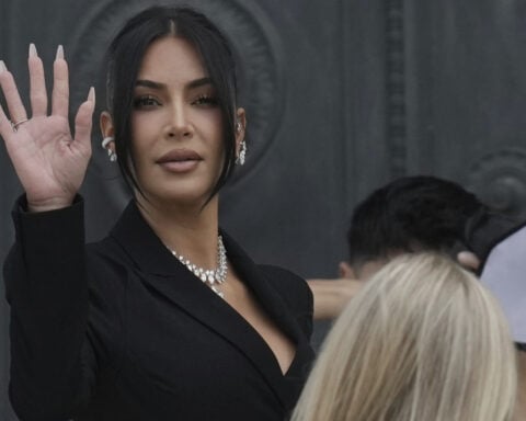 Kim Kardashian dons a graduation cap and marches closer to becoming a lawyer