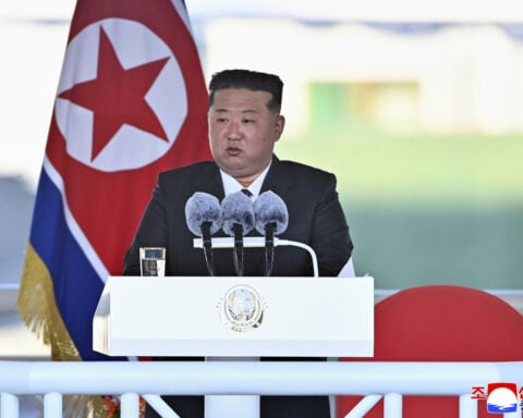 New North Korea warship is damaged at its launch ceremony attended by Kim Jong Un