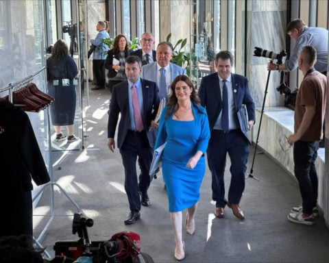 NZ budget flags lower growth from 'trade shock', but reins in spending to 10-year low