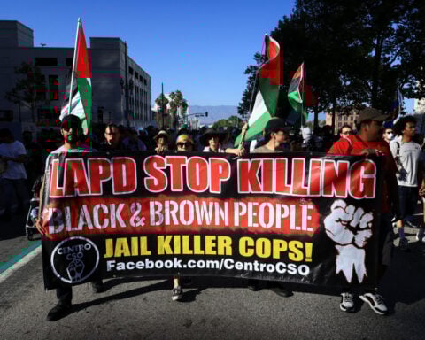 Police reform activists pledge to carry on after Trump drops oversight