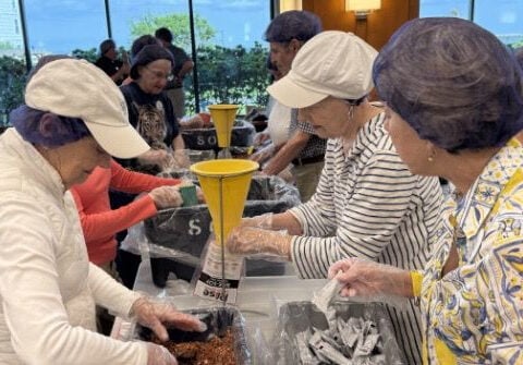 Virginia Beach seniors roll up their sleeves to pack 10,000+ meals
