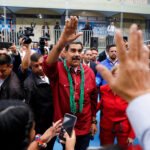 Venezuela ruling party keeps control of legislature amid opposition division