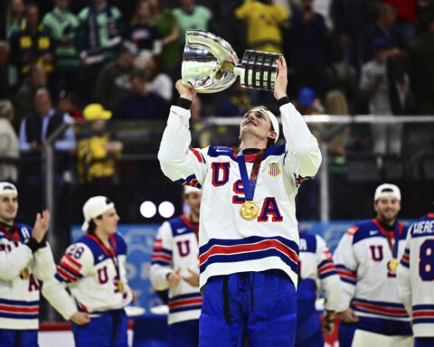 US wins 1st world hockey title since 1933 with 1-0 OT victory over Switzerland