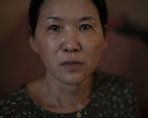 A woman sues South Korea's government after her son was adopted abroad without her consent