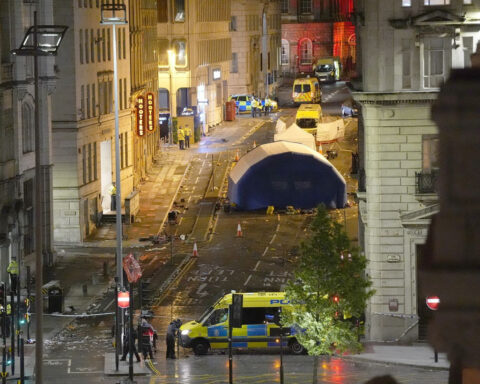 Dozens injured after car plows into crowd celebrating Liverpool soccer triumph. Police arrest man, rule out terrorism