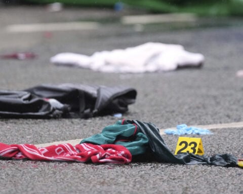 Driver arrested on suspicion of attempted murder after Liverpool soccer parade tragedy