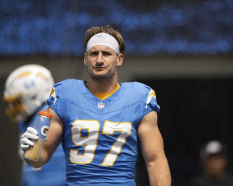Bills edge rusher Bosa sidelined by calf injury. Running back Cook absent from voluntary practice
