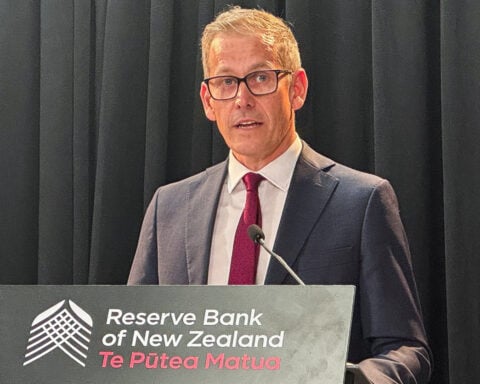 New Zealand cuts rates 25 bps, flags slightly deeper easing cycle as global risks mount