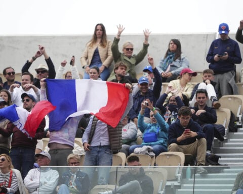 Opponents of French players at the French Open deal with insults and whistling and, yes, even gum