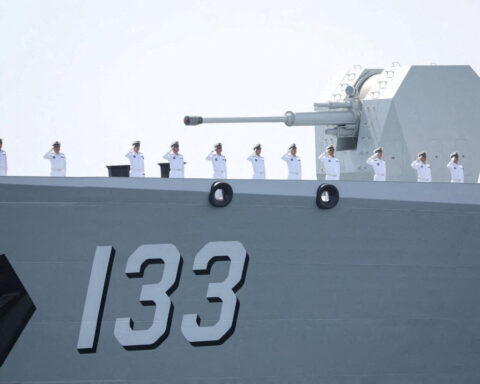China flexes military muscle with East Asian naval activity, sources say