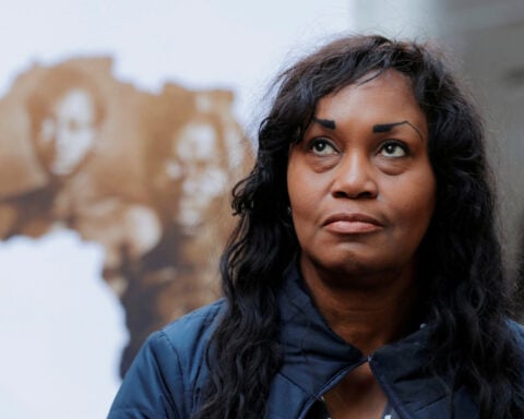 Harvard to relinquish slave photos to resolve descendant's lawsuit